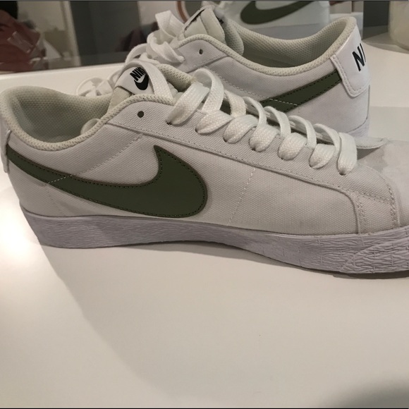 white nikes with green swoosh